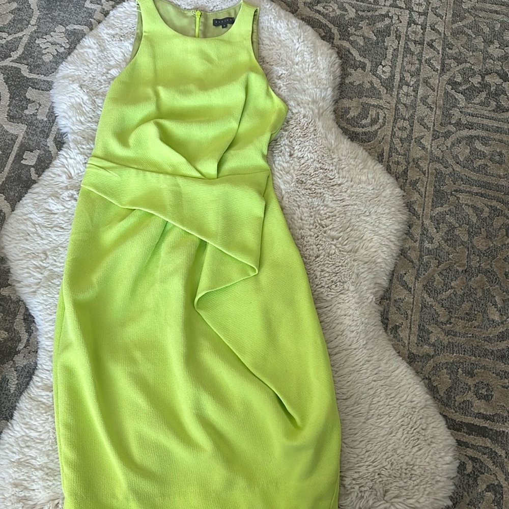 Neon green peplum style dress